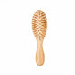 Bamboo Hairbrush that is completely plastic-free. With Bamboo pins, bamboo handle and natural rubber backing.