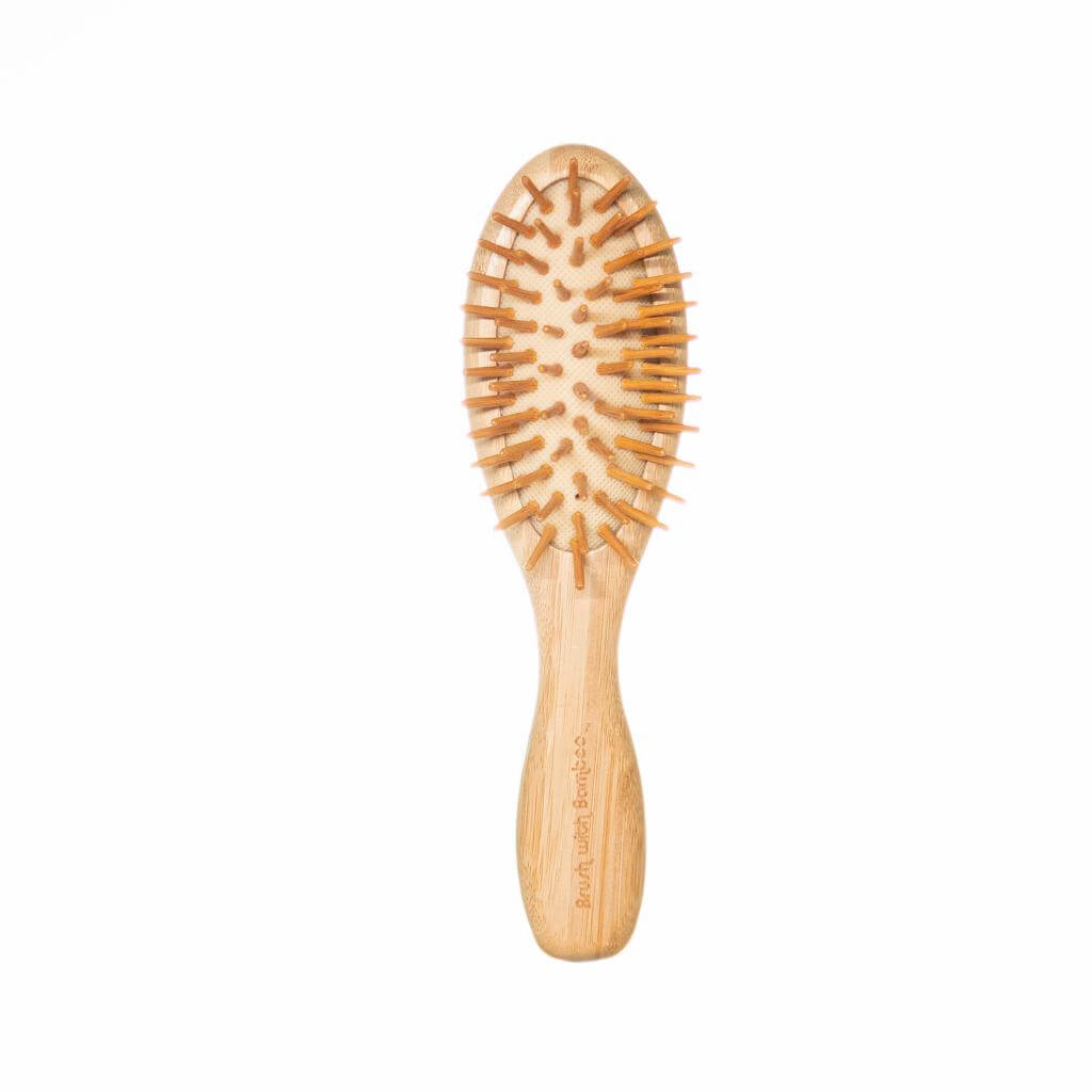 Bamboo Hairbrush that is completely plastic-free. With Bamboo pins, bamboo handle and natural rubber backing.